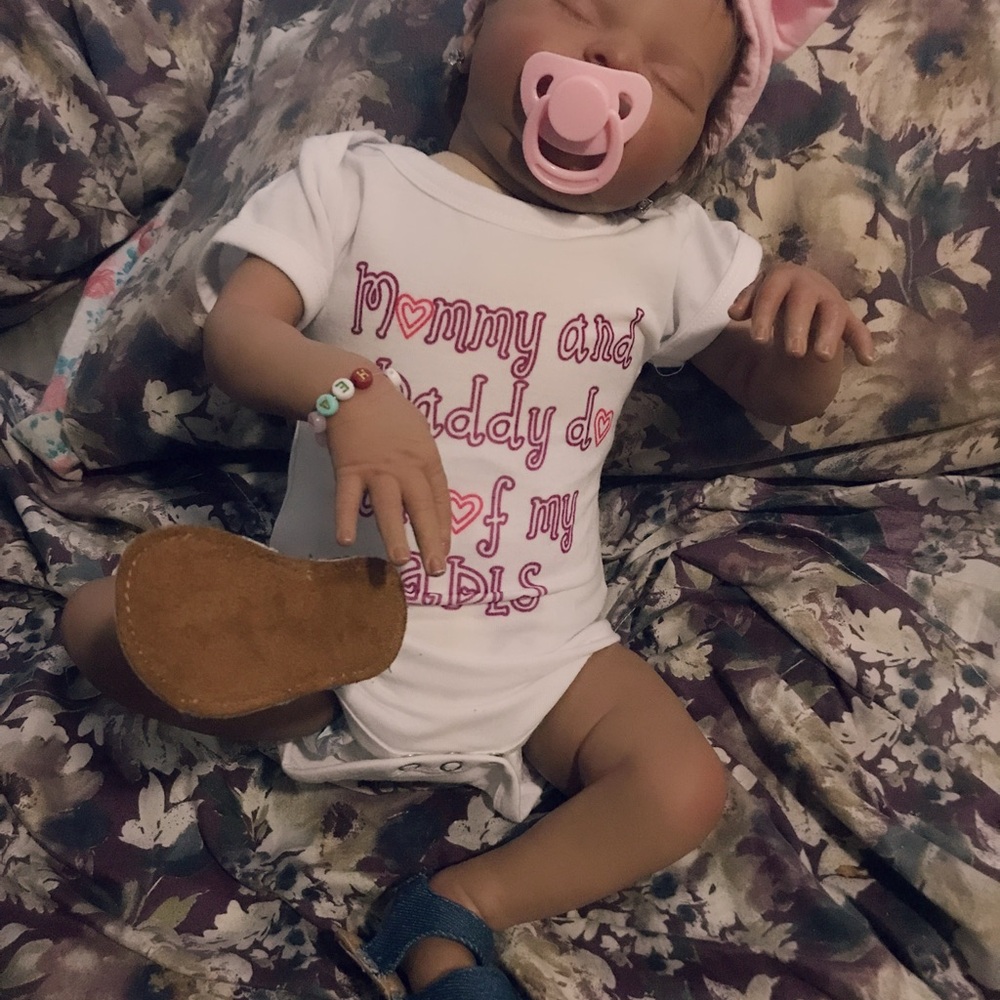 Nike Doll with Pink Pacifier and Blue Shoes